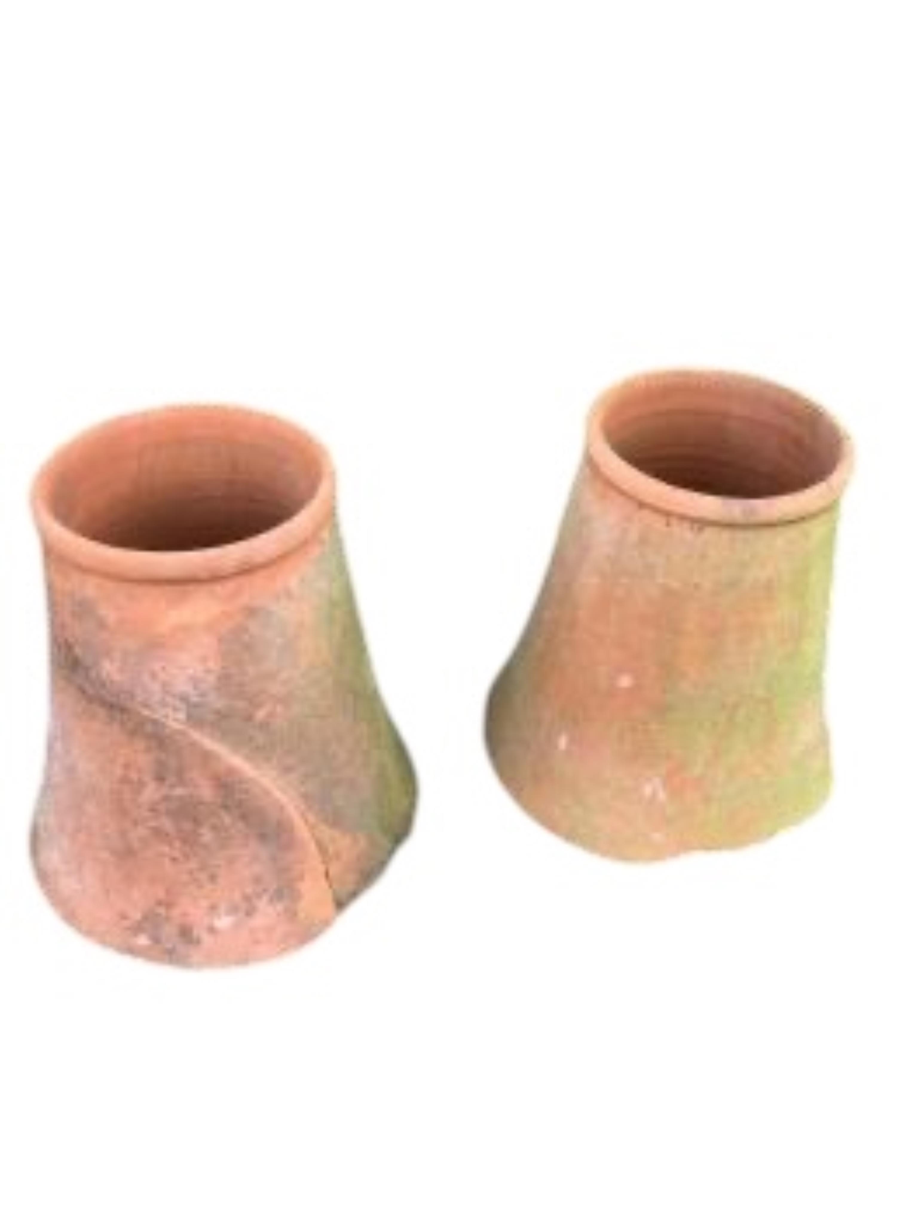 A pair of terracotta rhubarb planters, height 46cm (one severely cracked)